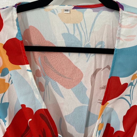 Abstract Print Plunging Neck Layered Hem Dress - Picture 3 of 4